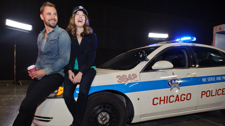 Chicago PD stars Patrick Flueger and Marina Squerciati posing