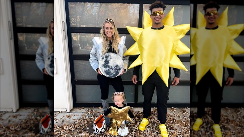 The Mahomes family in star, moon, and sun costumes