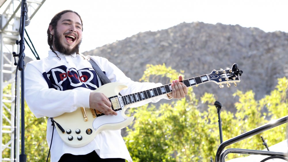 Post Malone performs on stage