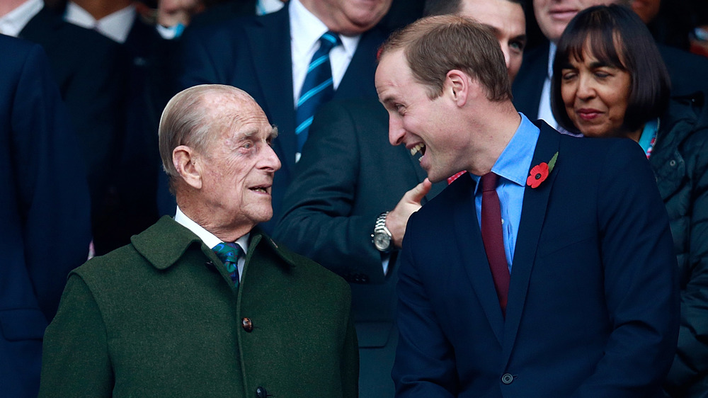 Prince Philip and Prince William laughing