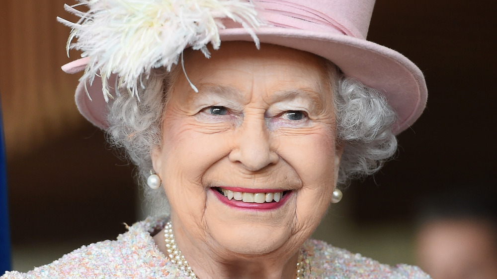 Queen Elizabeth II smiling at an event