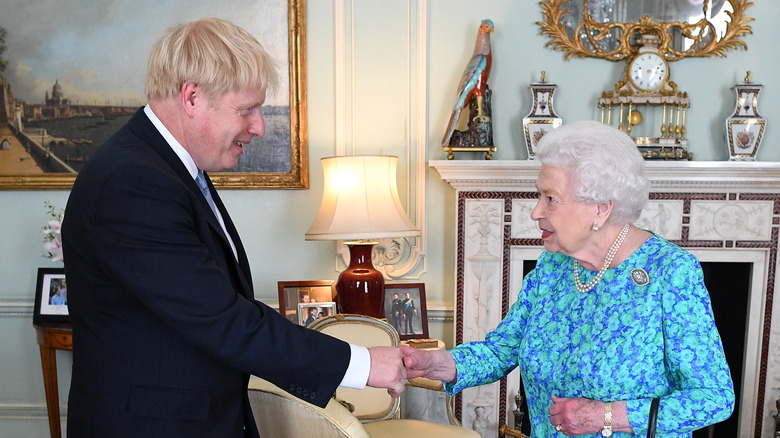 Boris Johnson shakes hands with Queen Elizabeth 