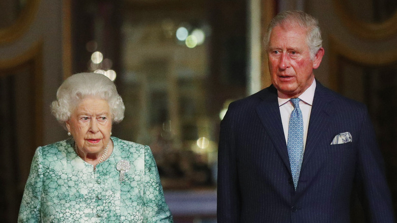 Queen Elizabeth II and King Charles III walking