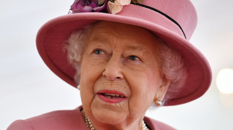 Queen Elizabeth in a pink outfit 