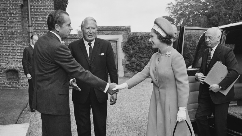 Richard Nixon shaking hands with Queen Elizabeth