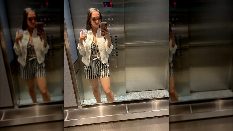 Julia Macchio in an elevator selfie