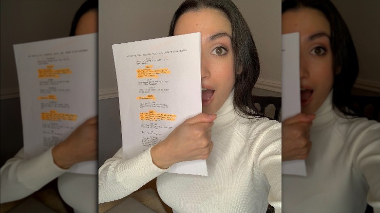 Julia Macchio with a script