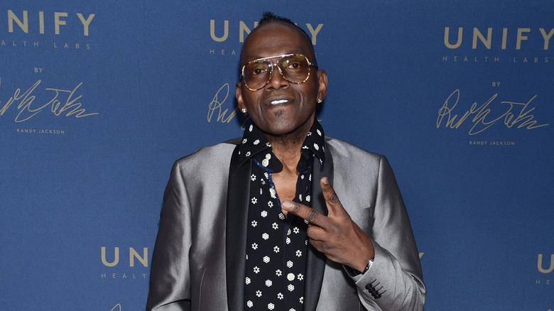 Randy Jackson wears a silver suit in 2019