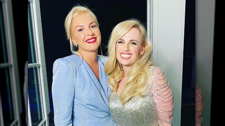 Ramona Agruma and Rebel Wilson smiling