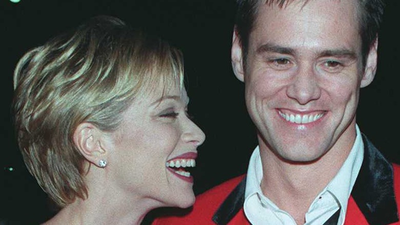 Jim Carrey and Lauren Holly laugh