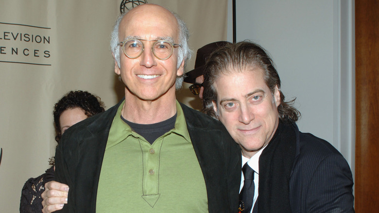 Richard Lewis with arm around Larry David