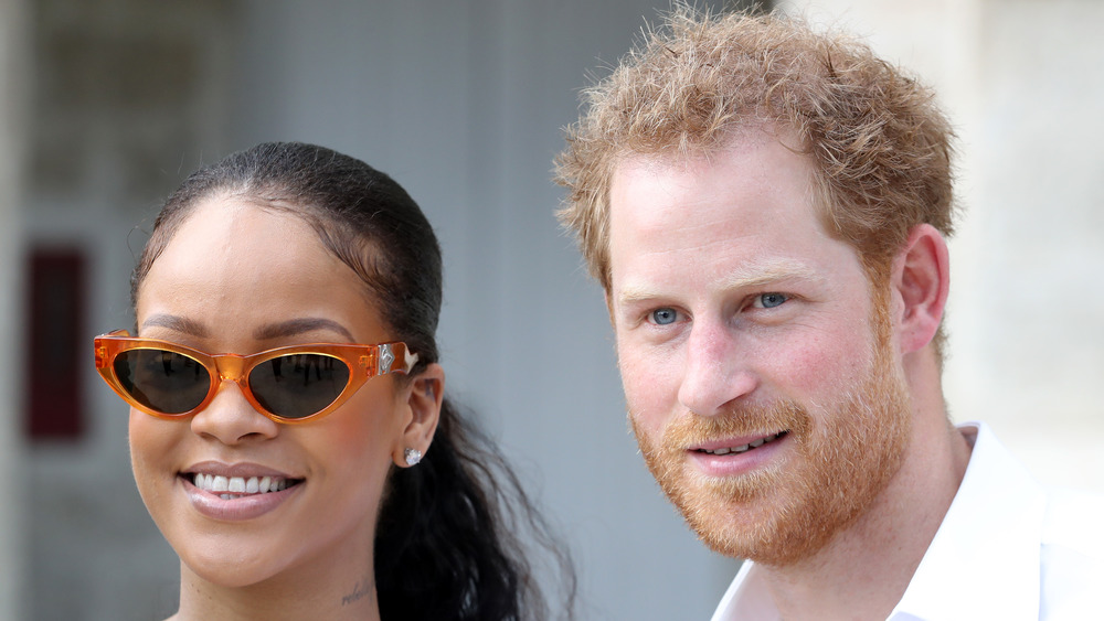 Rihanna and Prince Harry smiling together in Barbados