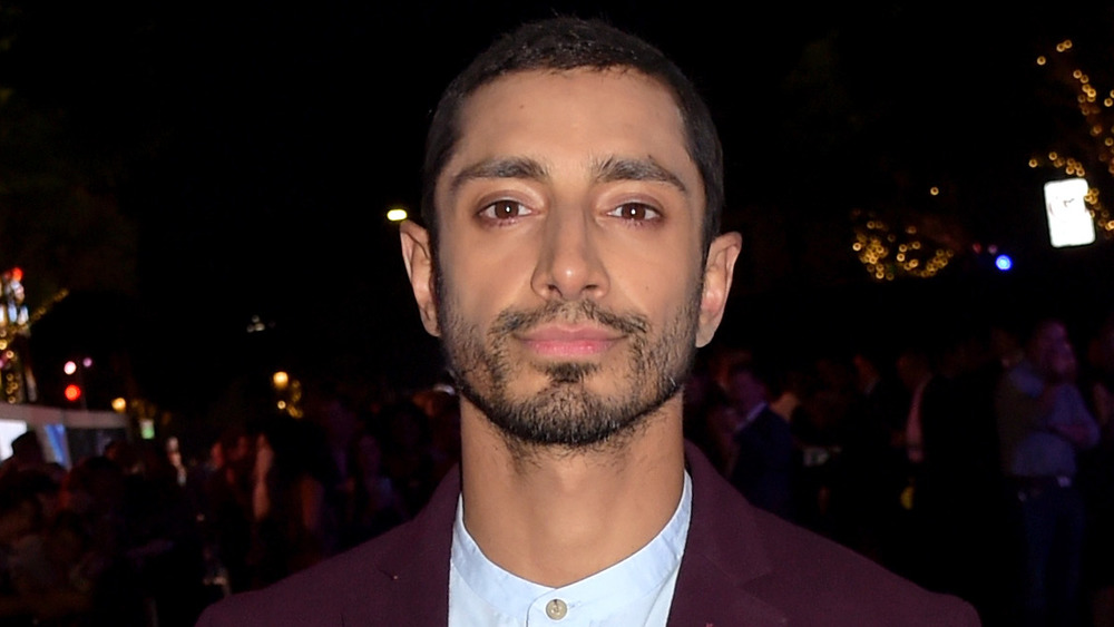 Riz Ahmed smiling