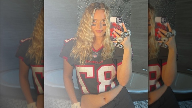 Camille Kostek wearing Rob Gronkowski's jersey