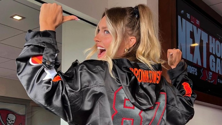 Camille Kostek wearing a Rob Gronkowski jersey