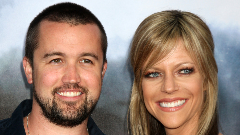 Rob McElhenney and Kaitlin Olson smiling in 2010