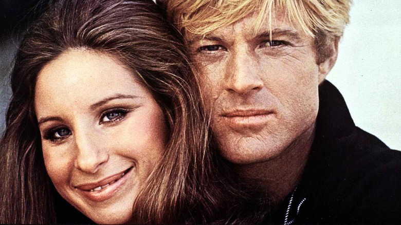 Barbra Streisand and Robert Redford posing