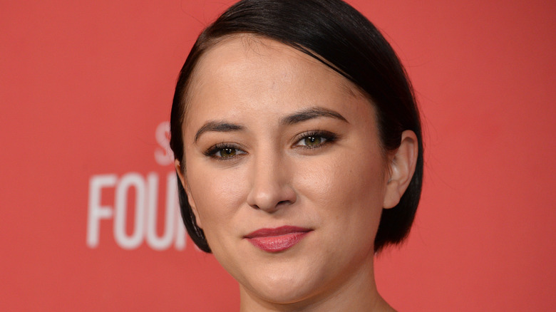 Zelda Williams, half smiling at 2017 event