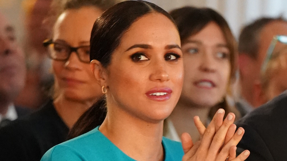 Meghan Markle looking upset and confused