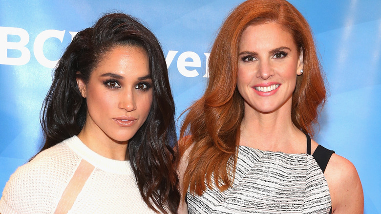 Meghan Markle and Sarah Rafferty posing red carpet