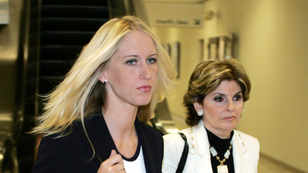 Amber Frey and Gloria Allred, walking