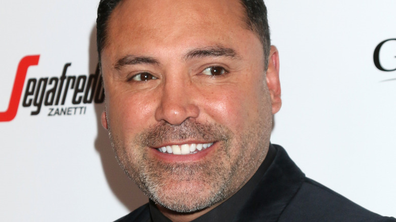 Oscar De La Hoya smiling at event