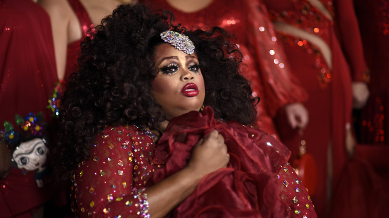 Silky Nutmeg Ganache, looking upset, wearing all red, 2020 photo from an event