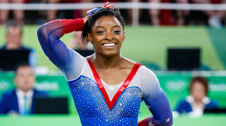 Simone Biles performing at event