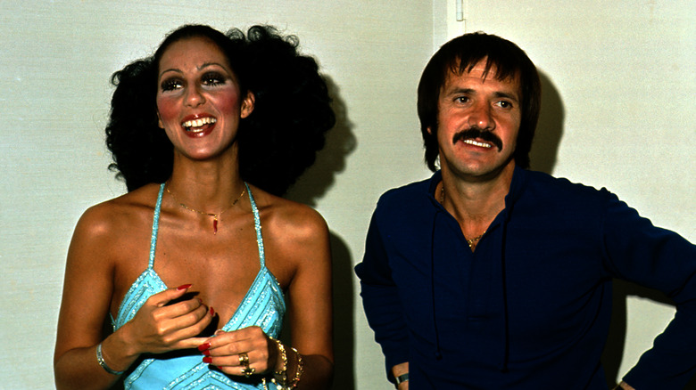 Sonny and Cher smiling but looking in different directions