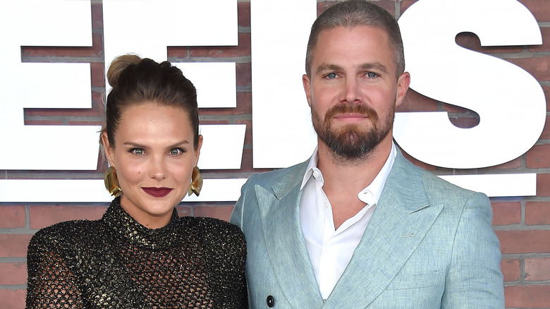 Cassandra Jean Amell and Stephen Amell on the red carpet