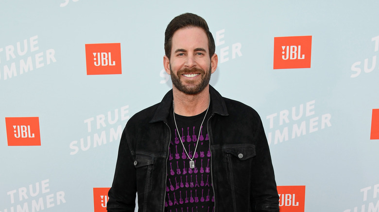 Tarek El Moussa posing on the red carpet 