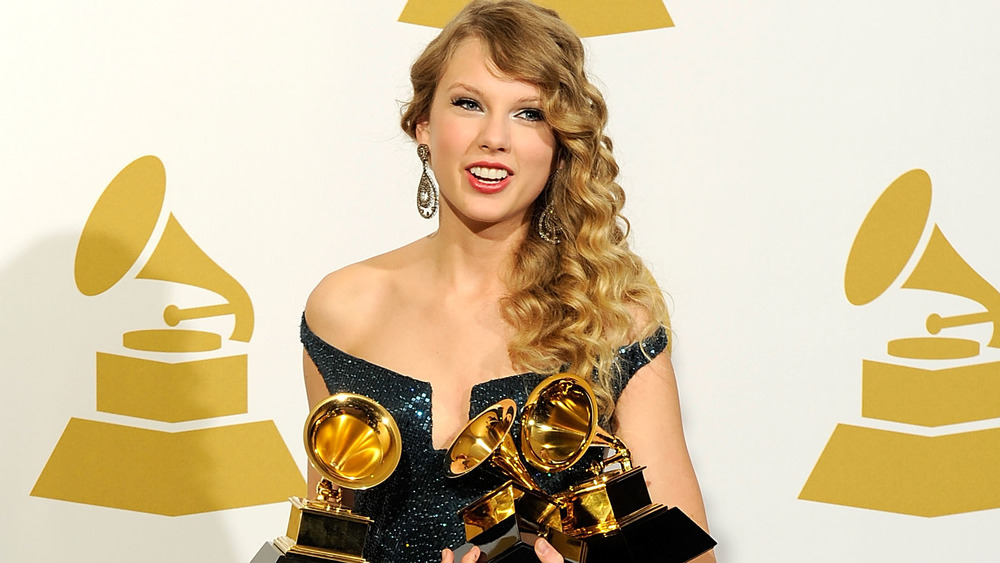 Taylor Swift smiling at the Grammys