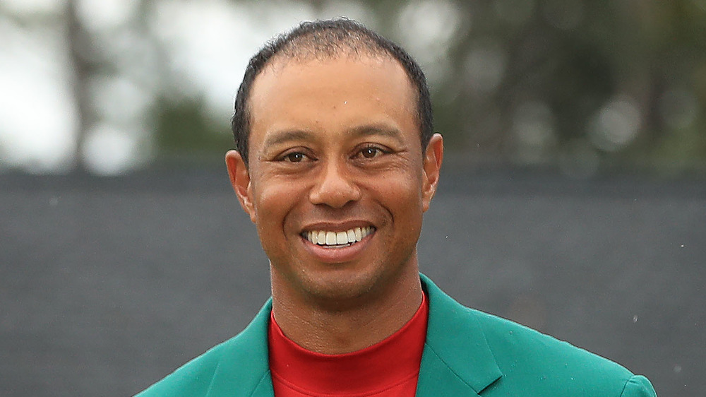 Tiger Woods smiling at an event