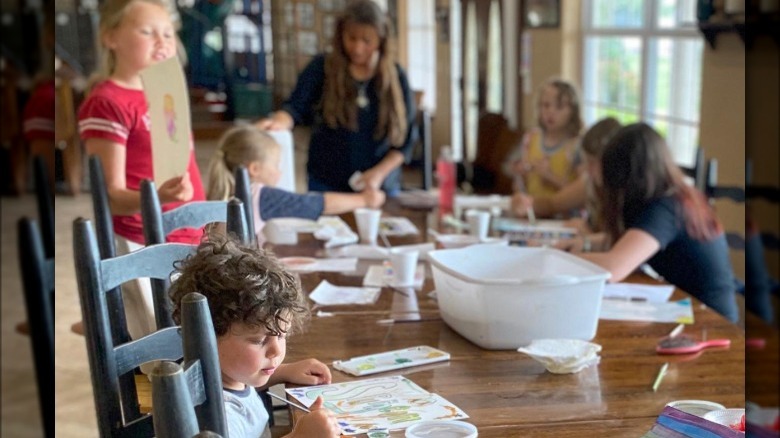 Michelle Duggar and children at table