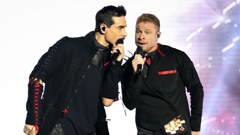 Kevin Richardson and Brian Littrell perform on stage