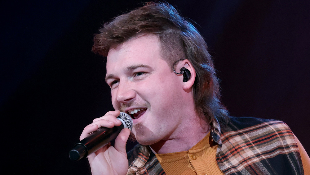 Morgan Wallen performing on stage