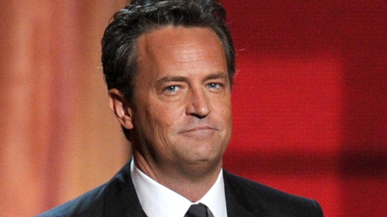 Matthew Perry speaks onstage