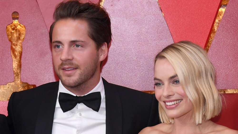 Tom Ackerley and Margot Robbie