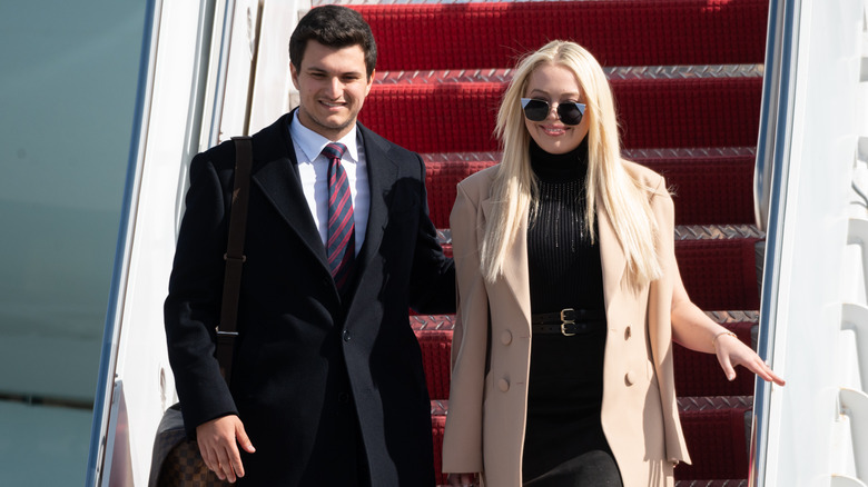 Tiffany Trump, Michael Boulos exiting Air Force 1