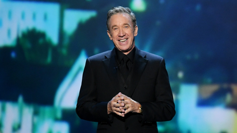 Tim Allen speaking onstage