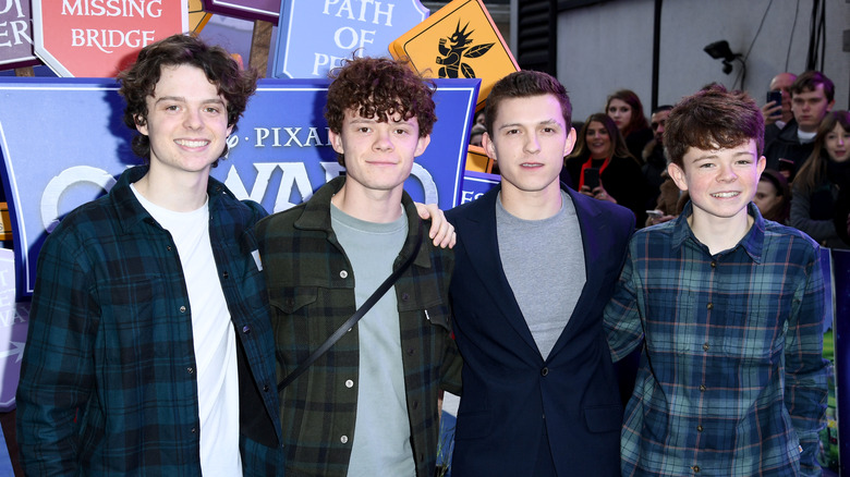 Sam holland, harry holland, tom holland, and paddy holland smiling