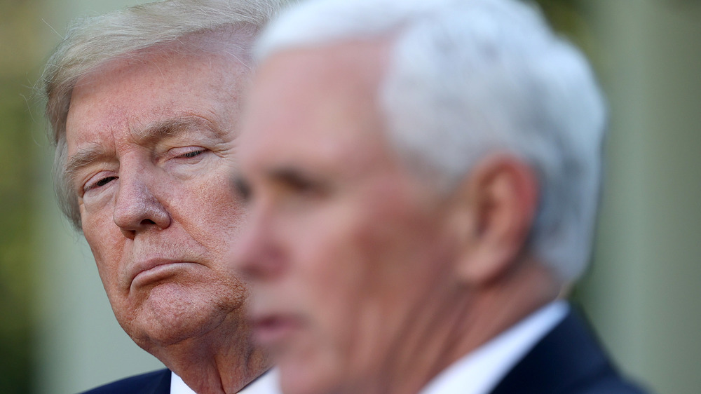 Donald Trump staring at Mike Pence