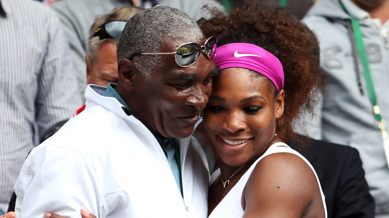 Richard and Serena Williams hug in 2012