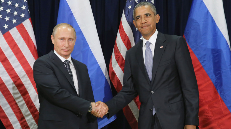 Vladimir Putin and Barack Obama shaking hands