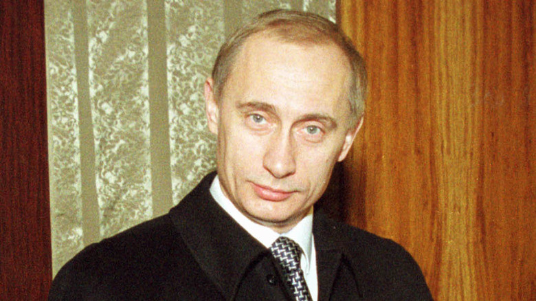 Vladimir Putin with smug expression