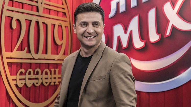 Volodymyr Zelenskyy smiling on stage