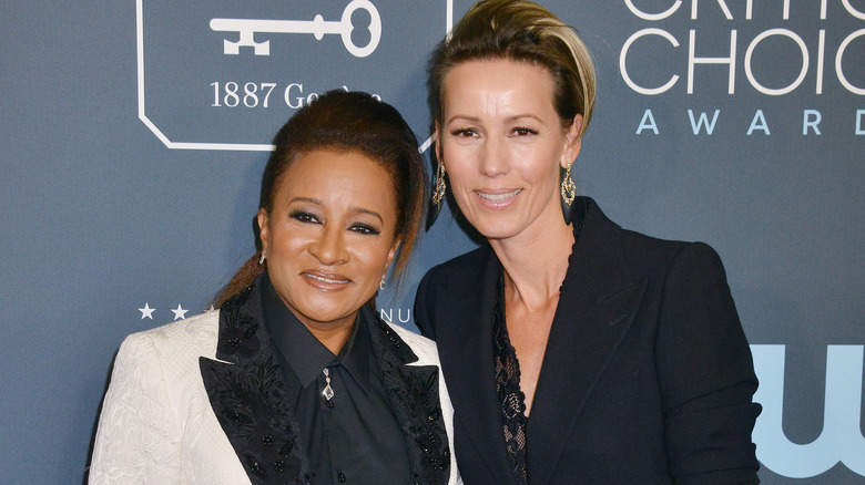 Wanda Sykes and wife Alex Sykes smiling together