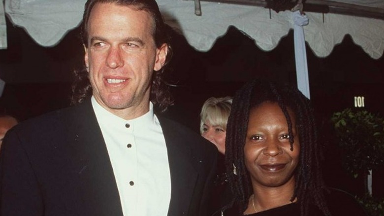 Whoopi Goldberg posing with Lyle Tratchenberg