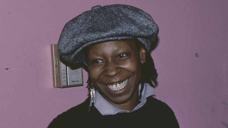 Whoopi Goldberg smiling in the '80s