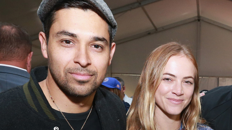 Wilmer Valderrama and Emily Wickersham smiling